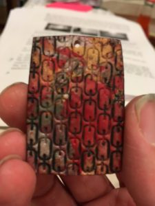 Stamped and marbled clay pendant